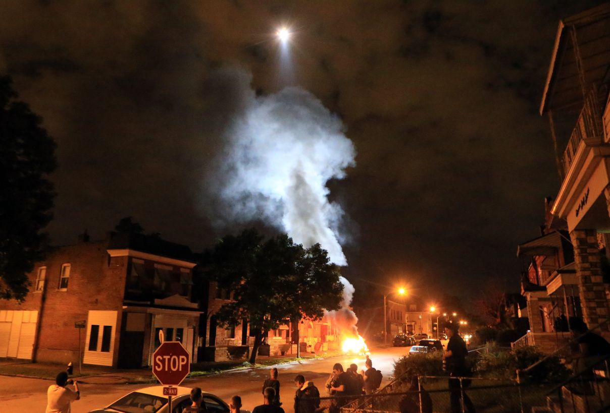 Helicopter over burning car